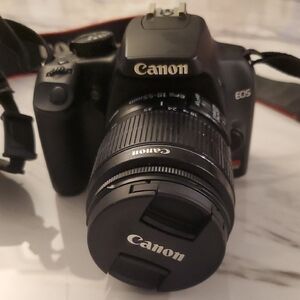 Canon Black DSLR Camera with Canon Zoom Lens